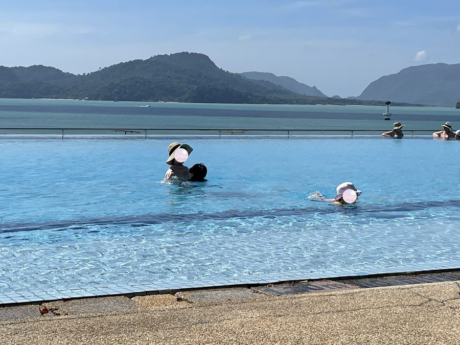 Swimming in the pool.