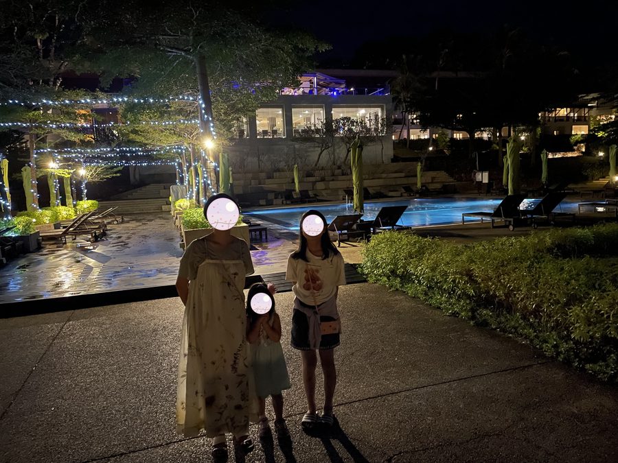 Lit up at night — the three of us out for a walk.