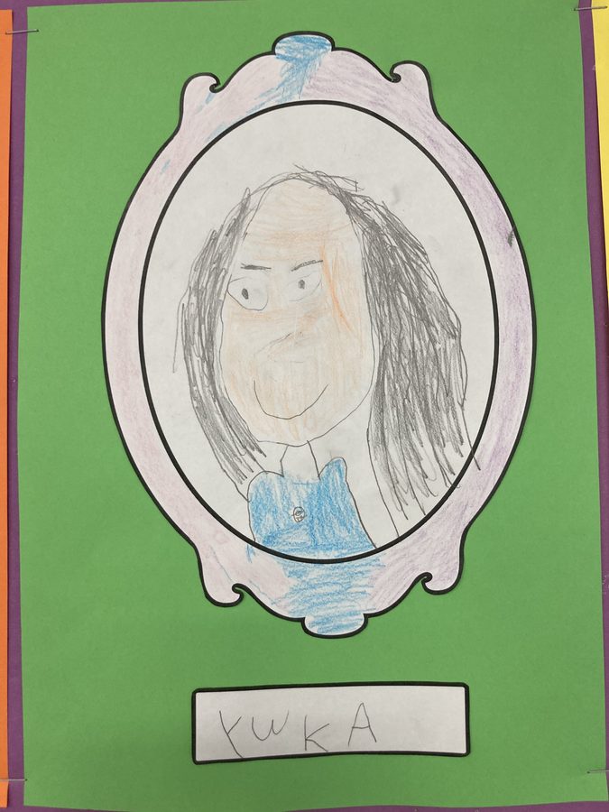 A self-portrait our younger daughter drew, put up in her classroom.