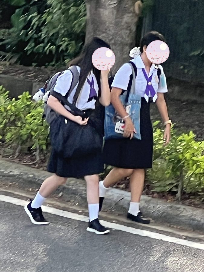 Setting off for school in uniform.