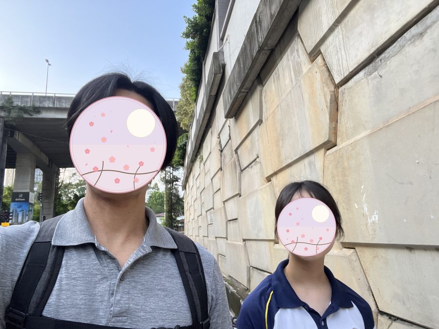 Meeting up with her father after school.