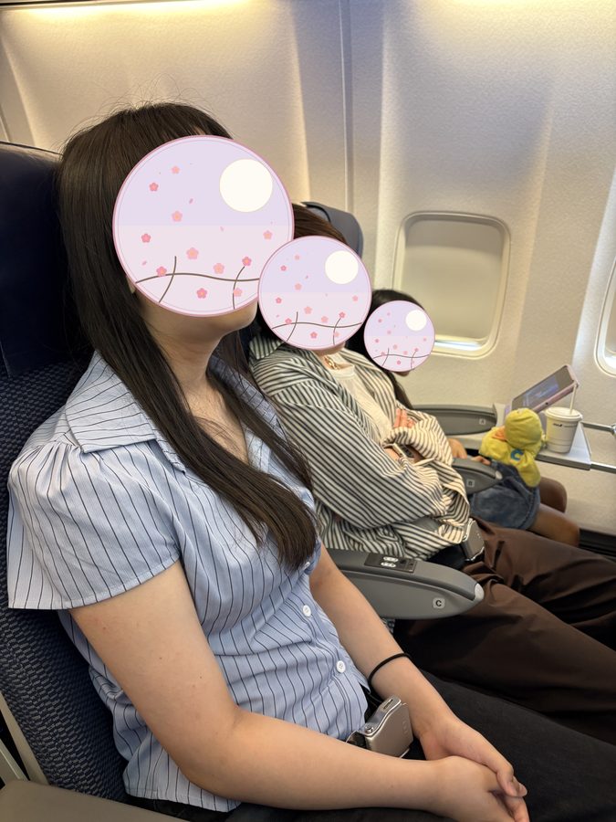 On the flight out. Both of them were asleep soon after take-off.