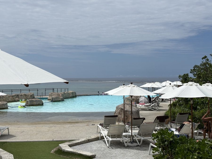 Loungers and parasols along the poolside