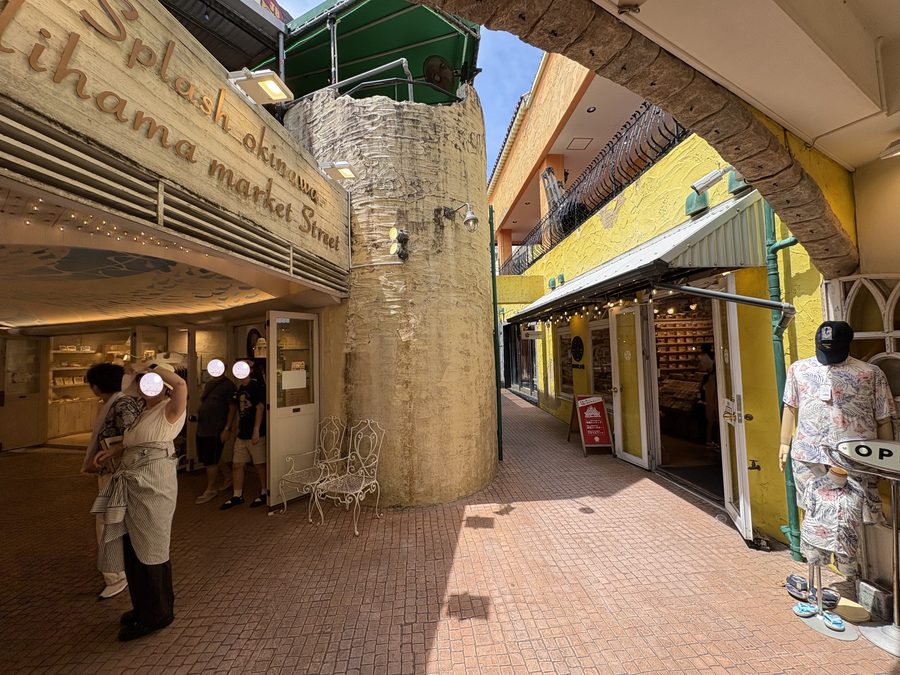 A nearby alley entrance that blends into the American Village streetscape