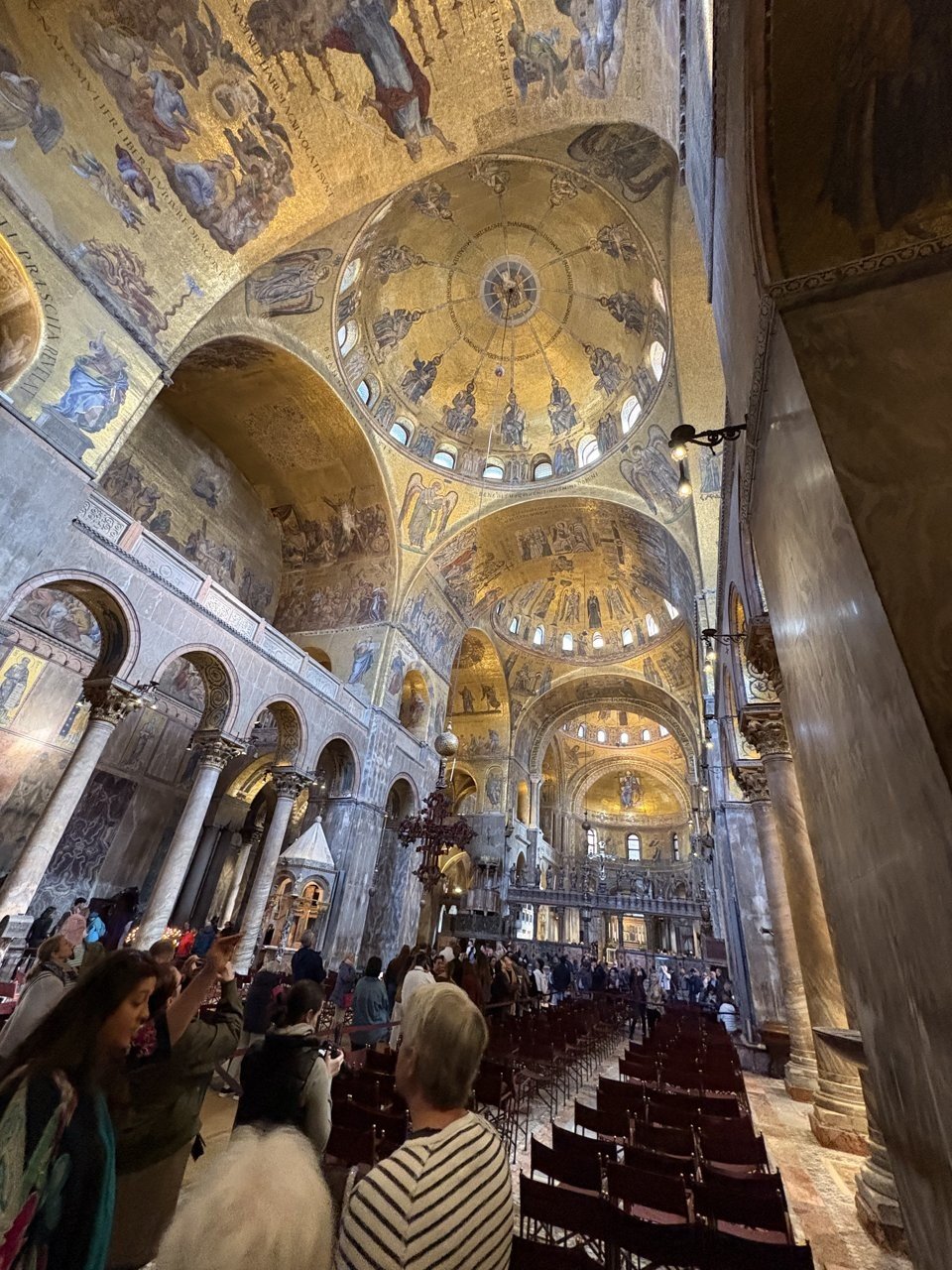 The golden mosaic ceiling inside St. Mark's Basilica