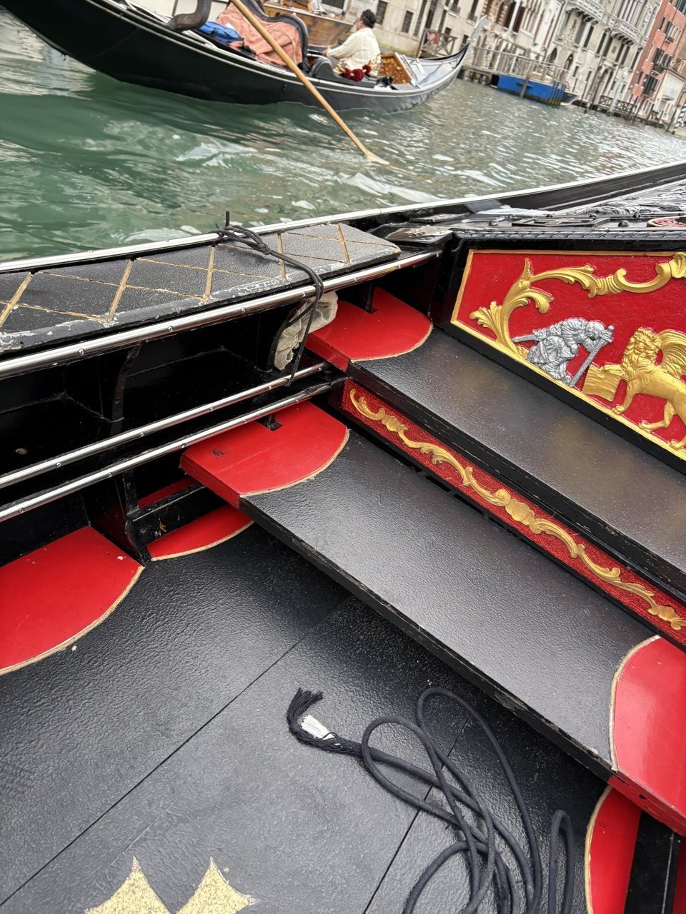The red seats of a gondola