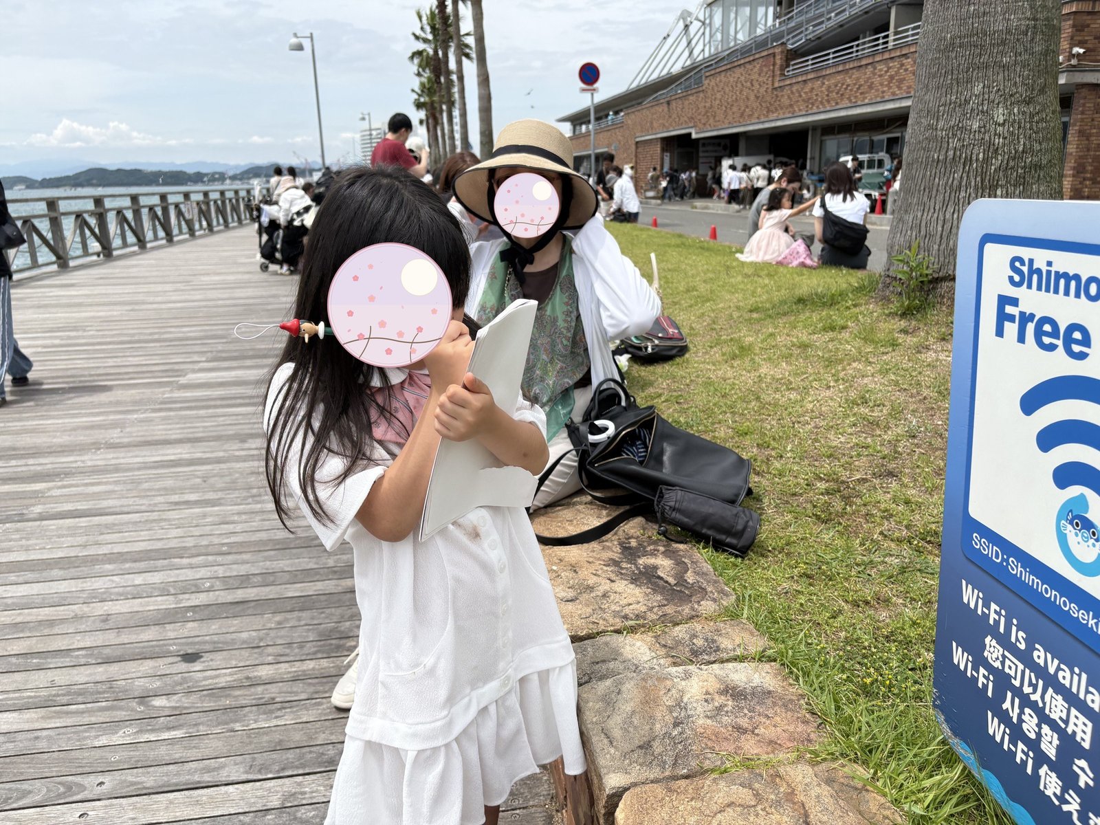 My daughter spending time with her grandmother along the waterfront promenade
